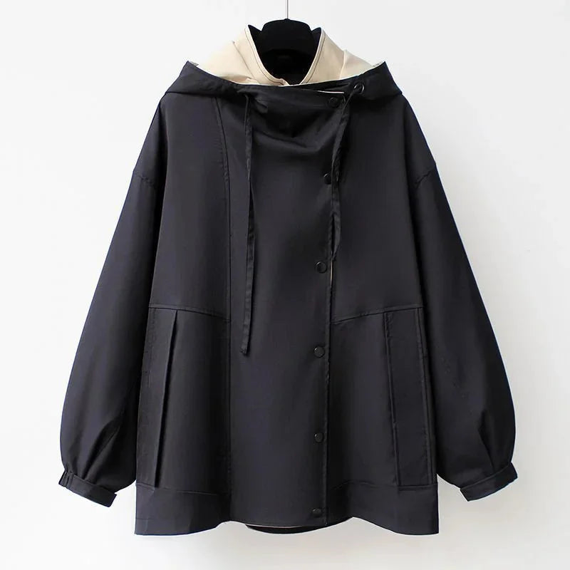 Trenchcoat Dames met Capuchon en Contrastkraag in Abrikoos, gedragen door model, vooraanzicht